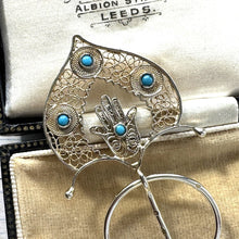 Cargar imagen en el visor de la galería, Antique French Silver, Gold & Turquoise Fibula Pin. Victorian/Edwardian Fine Cannetille Filigree Hamsa Brooch. Hand Of Fatima Amulet Fibula
