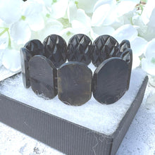Load image into Gallery viewer, Antique Victorian Carved Whitby Jet Bracelet. Wide Faceted Black Gemstone Mourning Bracelet. Antique Whitby Jet Stretch Cuff Bracelet