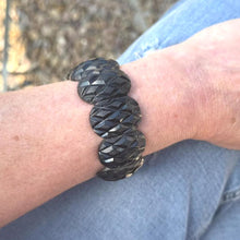 Load image into Gallery viewer, Antique Victorian Carved Whitby Jet Bracelet. Wide Faceted Black Gemstone Mourning Bracelet. Antique Whitby Jet Stretch Cuff Bracelet