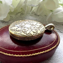 Carica l'immagine nel visualizzatore di Gallery, Antique Victorian Gold Tone Floral Locket Pendant: Engraved Oval Photo Keepsake