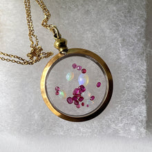 Carica l'immagine nel visualizzatore di Gallery, Antique Gold & Glass Shaker Locket Pendant Filled with Opals & Rubies