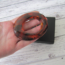 Cargar imagen en el visor de la galería, Huge 1930s Art Deco Amber Bakelite  Brooch. Abstract Ellipse Brooch. Translucent Root Beer Bakelite Statement Ring Brooch.