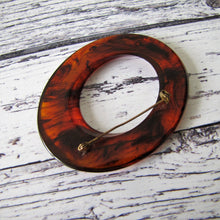 Cargar imagen en el visor de la galería, Huge 1930s Art Deco Amber Bakelite  Brooch. Abstract Ellipse Brooch. Translucent Root Beer Bakelite Statement Ring Brooch.