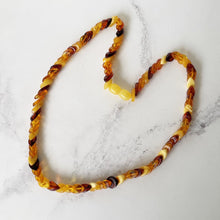 Load image into Gallery viewer, Vintage 1930s Baltic Amber Beaded Necklace. Mixed Cognac, Honey &amp; Egg Yolk Natural Amber Leaf Bead Necklace. Art Deco Collar Necklace
