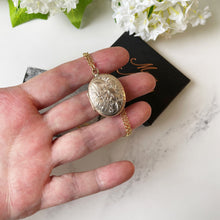 Cargar imagen en el visor de la galería, Antique Gold Gilt Locket With Victorian Photographs. Engraved 2-Sided Oval Locket With Chain. Antique Puffy Photo Locket Necklace