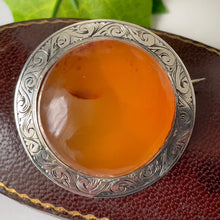 Cargar imagen en el visor de la galería, Antique Victorian Scottish Carnelian Brooch. Floral Engraved Sterling Silver Celtic Disc Brooch. Antique Victorian Scottish Pebble Jewellery