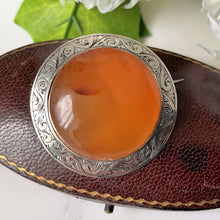 Cargar imagen en el visor de la galería, Antique Victorian Scottish Carnelian Brooch. Floral Engraved Sterling Silver Celtic Disc Brooch. Antique Victorian Scottish Pebble Jewellery