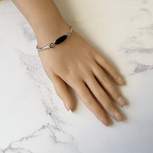 Carica l'immagine nel visualizzatore di Gallery, Vintage English Silver Whitby Jet Bangle, Hallmarked London 1975. Narrow Torque Style Black Gemstone Sterling Silver Bracelet.