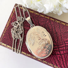 Load image into Gallery viewer, Vintage Sterling Silver Engraved Lily Locket Necklace. Edwardian Art Nouveau Revival Oval Photo Locket Pendant, Andreas Daub, Germany
