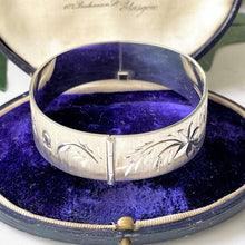 Cargar imagen en el visor de la galería, Vintage Floral Engraved Sterling Silver Bangle Bracelet. 1970s Sweetheart Bangle With Oversized British Hallmarks. Retro Statement Bracelet