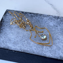 Lade das Bild in den Galerie-Viewer, Edwardian 9ct Gold Aquamarine Pendant Necklace. Art Nouveau Gold Openwork Necklace. Antique Pale Blue Gemstone Solitaire Pendant & Chain.