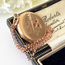 Load image into Gallery viewer, Antique Edwardian Rose Gold Pearl & Ruby Locket. Floral Engraved 9ct Rolled Gold Locket On Chain. Round Photo Locket Pendant Necklace.