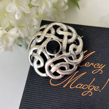 Carica l'immagine nel visualizzatore di Gallery, Vintage Whitby Jet Celtic Framed Sterling Silver Brooch. Arts & Crafts Style Celtic Knotwork Disc Brooch. Eternity/Love Knot Sash/Lapel Pin