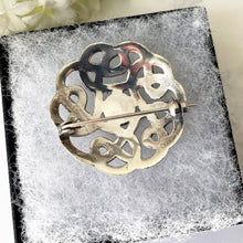 Carica l'immagine nel visualizzatore di Gallery, Vintage Whitby Jet Celtic Framed Sterling Silver Brooch. Arts & Crafts Style Celtic Knotwork Disc Brooch. Eternity/Love Knot Sash/Lapel Pin