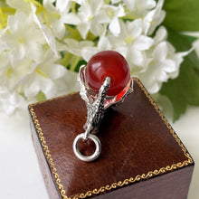 Cargar imagen en el visor de la galería, Vintage Scottish Silver Claw Carnelian Pendant. Large Carved Scottish Hardstone Orb Pendant Fob. 1960s Sterling Silver Figural Pendant.