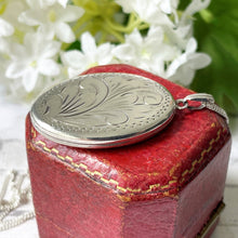 Lade das Bild in den Galerie-Viewer, Vintage Edwardian Style English Sterling Silver Locket & Curb Chain. 1970s Floral Engraved Slender Oval Photo Locket Necklace.