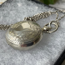 Lade das Bild in den Galerie-Viewer, Antique English Silver Sovereign Case Locket Pendant Necklace. Edwardian Forget-Me-Not Engraved Round Puffy Keepsake Locket Pendant On Chain