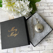 Lade das Bild in den Galerie-Viewer, Antique English Silver Sovereign Case Locket Pendant Necklace. Edwardian Forget-Me-Not Engraved Round Puffy Keepsake Locket Pendant On Chain