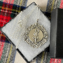 Cargar imagen en el visor de la galería, Vintage Scottish Silver Highland Fling Fob Pendant Necklace. Large Engraved Thistle, Rose & Shamrock Scottish Dancing Medal Dated 1954.