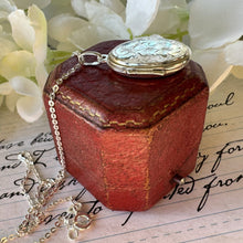 Cargar imagen en el visor de la galería, Vintage Sterling Silver Engraved Dogwood Blossom Locket Pendant & Chain. Small Oval Flower Locket Necklace. Petite Floral Photo Locket