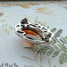 Load image into Gallery viewer, Vintage Scottish Silver Celtic Knot Dendritic Agate Brooch. Oval Sterling Silver Eternity/Love Knot Cairngorm Scottish Pebble Lapel Pin.
