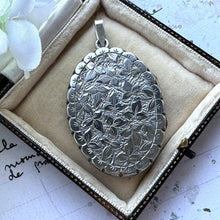 Load image into Gallery viewer, Antique Victorian Sterling Silver Engraved Ivy Locket Pendant. Large Ornate Flat Oval Photo Locket. Aesthetic Engraved Sweetheart Locket
