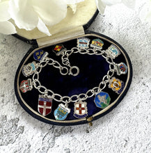 Lade das Bild in den Galerie-Viewer, Vintage 1960s Britain &amp; Germany Sterling Silver Enamel Charm Bracelet. City Coat of Arms Souvenir Travel Bracelet With St Christopher Charm
