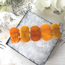 Load image into Gallery viewer, Antique Genuine Baltic Amber Panel Bracelet. Art Deco Carved Egg Yolk Amber Stretch Bracelet. Natural Untreated Amber Bracelet

