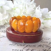 Load image into Gallery viewer, Antique Genuine Baltic Amber Panel Bracelet. Art Deco Carved Egg Yolk Amber Stretch Bracelet. Natural Untreated Amber Bracelet
