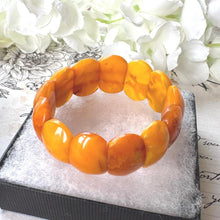 Load image into Gallery viewer, Antique Genuine Baltic Amber Panel Bracelet. Art Deco Carved Egg Yolk Amber Stretch Bracelet. Natural Untreated Amber Bracelet

