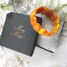 Load image into Gallery viewer, Antique Genuine Baltic Amber Panel Bracelet. Art Deco Carved Egg Yolk Amber Stretch Bracelet. Natural Untreated Amber Bracelet
