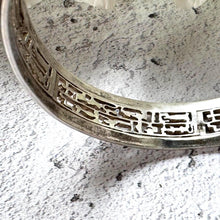Load image into Gallery viewer, Vintage Sterling Silver Egyptian Hieroglyphic Amulet Bangle: 1970s Talisman Jewellery
