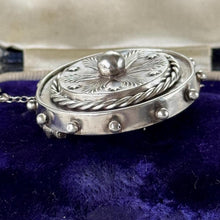 Load image into Gallery viewer, Antique Victorian Sterling Silver Keepsake Locket Brooch, Ship's Wheel Target Design. Aesthetic Movement Jewellery
