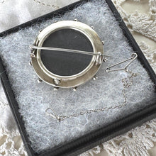 Load image into Gallery viewer, Antique Victorian Sterling Silver Keepsake Locket Brooch, Ship's Wheel Target Design. Aesthetic Movement Jewellery
