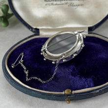Load image into Gallery viewer, Antique Victorian Sterling Silver Keepsake Locket Brooch, Ship's Wheel Target Design. Aesthetic Movement Jewellery
