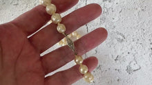 Load and play video in Gallery viewer, Vintage Round Baroque Pearl Necklace With Sterling Silver Filigree Clasp
