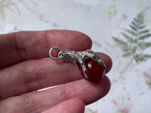Load and play video in Gallery viewer, Vintage Scottish Silver Claw Carnelian Pendant
