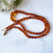 Lade das Bild in den Galerie-Viewer, Vintage 22&quot; Long Faceted Baltic Amber Bead Necklace
