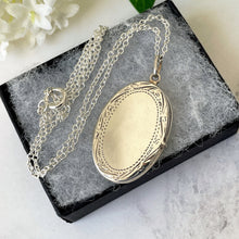 Load image into Gallery viewer, Vintage Edwardian Style Sterling Silver Locket &amp; Chain. Elongated Oval 2-Photo Locket, Engraved Border. Large Silver Locket Necklace
