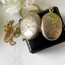 Load image into Gallery viewer, Antique Gold Gilt Locket With Victorian Photographs. Engraved 2-Sided Oval Locket With Chain. Antique Puffy Photo Locket Necklace
