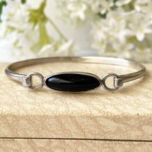 Load image into Gallery viewer, Vintage English Silver Whitby Jet Bangle, Hallmarked London 1975. Narrow Torque Style Black Gemstone Sterling Silver Bracelet.
