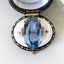 Load image into Gallery viewer, Vintage Blue Topaz 9ct Gold Cocktail Ring. 15ct Oval Step Cut Sky Blue Gemstone Ring. Large Topaz Solitaire Ring, 1969 Hallmark London
