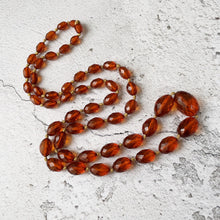 Load image into Gallery viewer, Antique Art Deco Baltic Amber Long Necklace. Large Faceted Olive Bead Genuine Amber Necklace. 1930s Vintage Cognac Amber 40&quot; Rope Necklace
