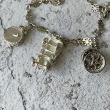 Load image into Gallery viewer, Vintage English Silver Daisy Chain Charm Bracelet. All Original 1960s Sterling Silver Bracelet, 5 Rare Nuvo Mechanical Charms.
