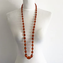 Load image into Gallery viewer, Antique Art Deco Baltic Amber Long Necklace. Large Faceted Olive Bead Genuine Amber Necklace. 1930s Vintage Cognac Amber 40&quot; Rope Necklace

