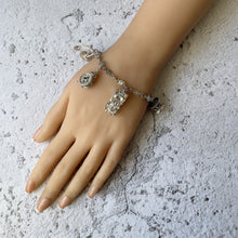 Load image into Gallery viewer, Vintage English Silver Daisy Chain Charm Bracelet. All Original 1960s Sterling Silver Bracelet, 5 Rare Nuvo Mechanical Charms.

