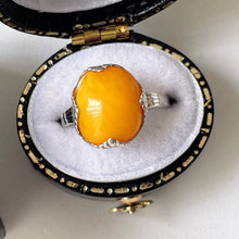 Load image into Gallery viewer, Antique Art Nouveau Butterscotch Amber 830 Silver Ring. Edwardian Period Ring. Egg Yolk Yellow Natural Amber Cabochon Ring. Size UK/M, US/6
