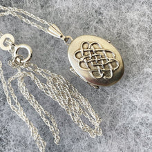 Load image into Gallery viewer, Vintage English Sterling Silver Celtic Locket. Tiny Oval Infinity Love Knot Locket &amp; Silver Chain. Minimalist Locket Pendant/Charm Necklace
