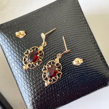 Load image into Gallery viewer, Vintage 14ct Gold Bohemian Garnet Dangle Earrings. Petite Antique Style Yellow Gold Heart Scroll Drop Earrings. Red Gemstone Post Earrings
