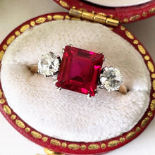 Load image into Gallery viewer, Vintage Art Deco 9ct Gold Ruby &amp; White Sapphire Ring. Square/Princess Cut Pink Ruby 3-Stone Trilogy Engagement Ring, Size UK M/ US 6.75
